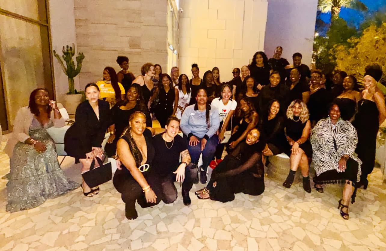 A large evening group portrait of WEPN women